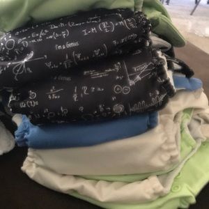 8 Bum Genius Cloth Diapers and 9 inserts